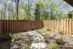 Fenced-in yard renders privacy & peace of mind for kids at play